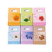 Six hang-tab sticker boxes in orange, green, pink, pale blue, lilac and tan lined up, one for each flower pattern