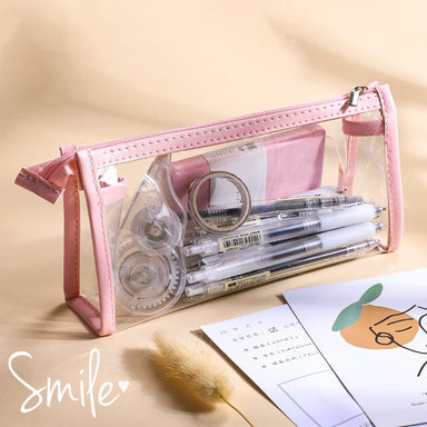Sakura pink clear triangular pencil case holding gel pens, correction tape and washi tape
