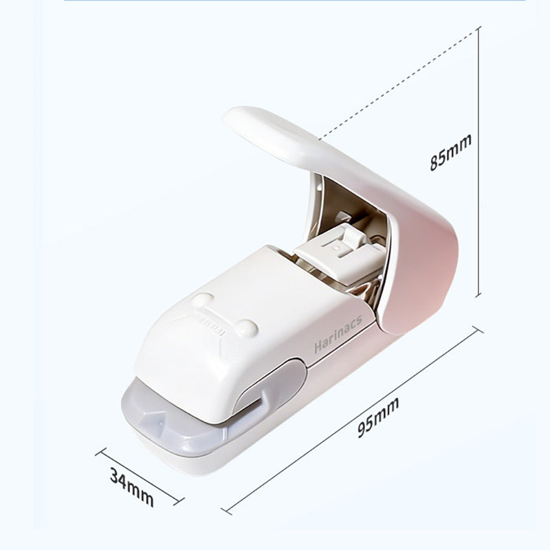 Pale white stapleless stapler with size markings: 34 mm wide, 95 mm long and 85 mm high