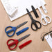 KOKUYO SAXA fluorine-coated scissors in red, blue and white are displayed together.