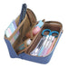 Open blue tray pen case holding a ruler, index tabs, tape, scissors, a cutter, gel pens and a pencil in three tiers