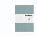 Dusty blue PAPERIDEAS softcover notebook with white belly band and soft-cover flex icon.