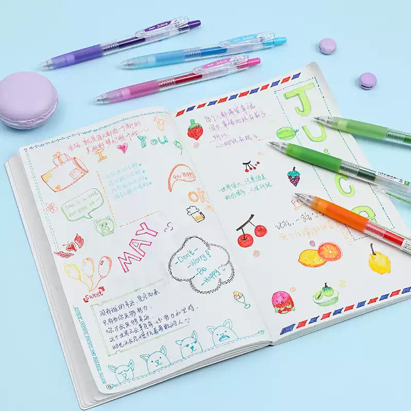 Bundle of gel pens surrounded by small flower stickers on a desk