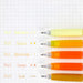 Orange-family gel pens grouped with a matching ink swatch color chart