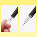 Hands unscrewing the clear tip of a black mechanical pencil to show lead refilling and tip access