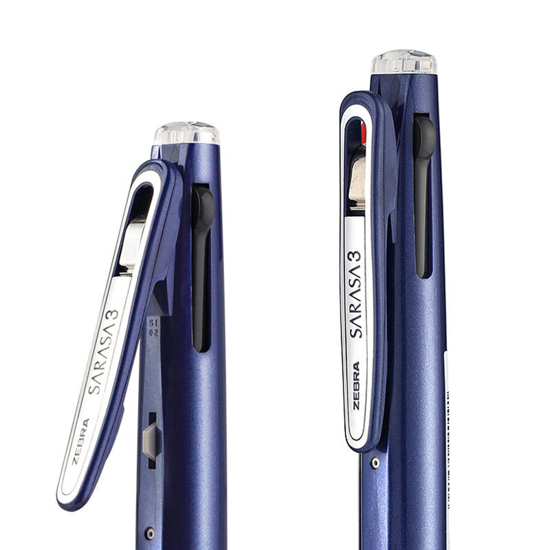 Navy multi pen with a wide clip and a close-up of the push button hidden beneath the clip
